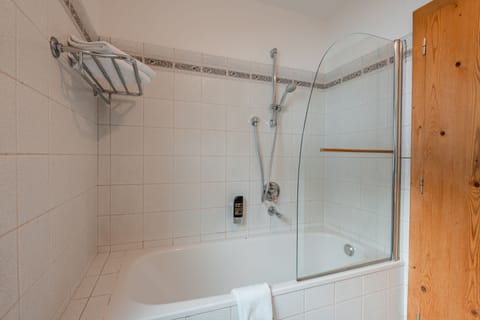 Family Apartment, 1 Bedroom, Balcony, Mountain View (Sonnenstein) | Bathroom | Combined shower/tub, hair dryer, bathrobes, slippers