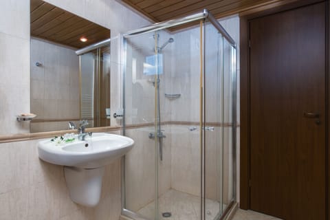 Standard Room (Free Sauna & Steam Bath) | Bathroom | Shower, free toiletries, hair dryer, towels