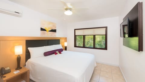 Suite, 1 King Bed with Sofa bed, Pool View | In-room safe, iron/ironing board, free WiFi, bed sheets