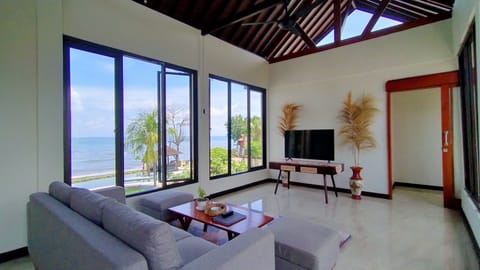 Villa, 3 Bedrooms, Private Pool | Living area | 50-inch Smart TV with cable channels, TV