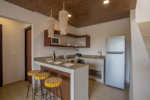 Premium Apartment | Private kitchen | Full-size fridge, microwave, cookware/dishes/utensils