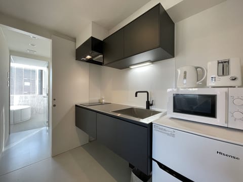 bHotel Nekoyard 1001, Premium Condo, Non Smoking | Private kitchen | Fridge, microwave, stovetop, electric kettle