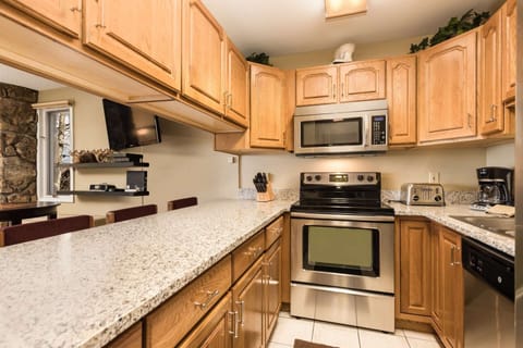 Condo (Lichenhearth 21) | Private kitchen | Full-size fridge, microwave, oven, stovetop