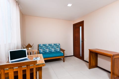 Deluxe Double Room | Living room | TV