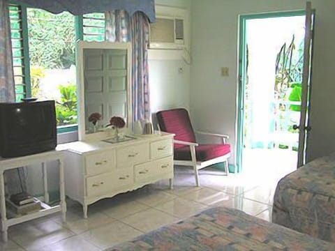 Standard Double Room | Living area | TV