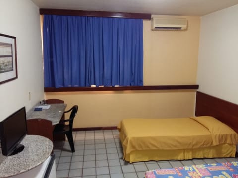 Standard Single Room | Minibar, in-room safe, blackout drapes, free WiFi