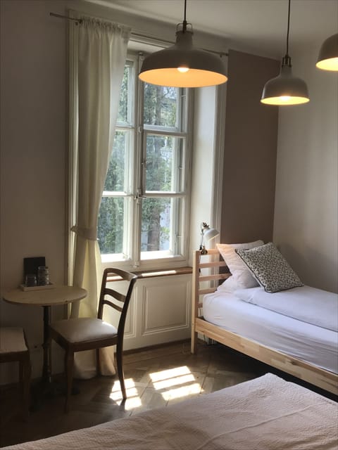 Triple Room, Shared Bathroom | Iron/ironing board, rollaway beds, free WiFi, bed sheets