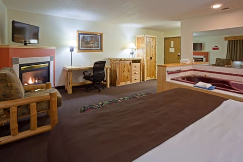 Superior Studio Suite, 1 King Bed, Jacuzzi, Fireplace, Non Smoking | Desk, iron/ironing board, rollaway beds, free WiFi