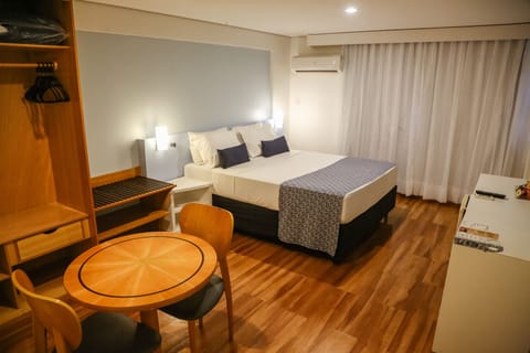 Premium Double Room | Minibar, in-room safe, desk, blackout drapes