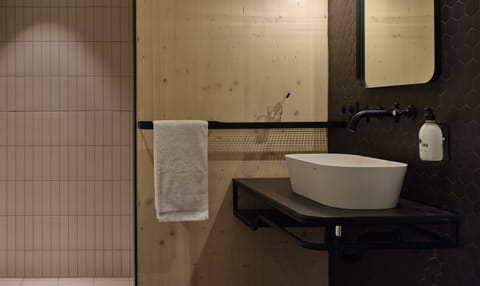 Shower, rainfall showerhead, hair dryer, towels