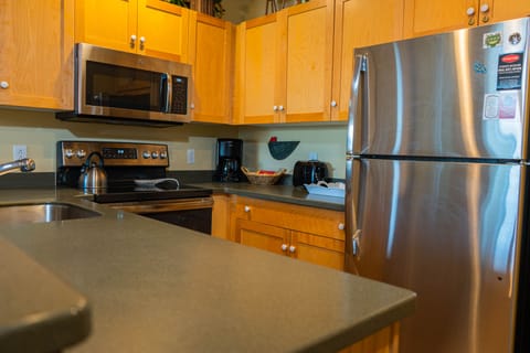 Condo, 2 Bedrooms | Private kitchen | Full-size fridge, microwave, oven, stovetop