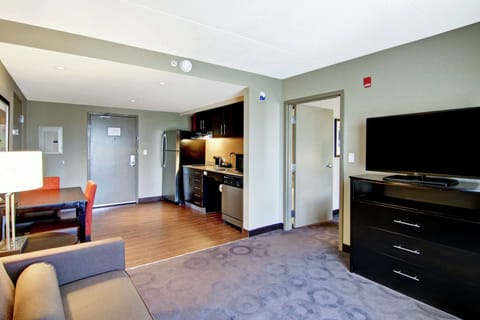 Suite, 1 King Bed, Accessible (Mobility & Hearing, Roll-in Shower) | Living area | Flat-screen TV, pay movies