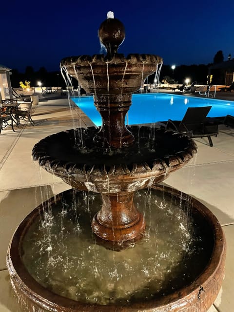 Outdoor pool, open 7:00 AM to 10:00 PM, sun loungers