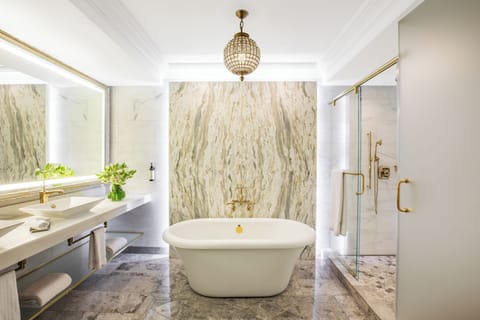 Designer toiletries, hair dryer, bathrobes, towels