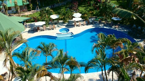 Outdoor pool, open 6:00 AM to 10:00 PM, pool umbrellas, sun loungers