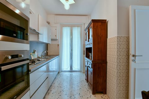 Apartment | Private kitchen | Full-size fridge, oven, dishwasher, cookware/dishes/utensils