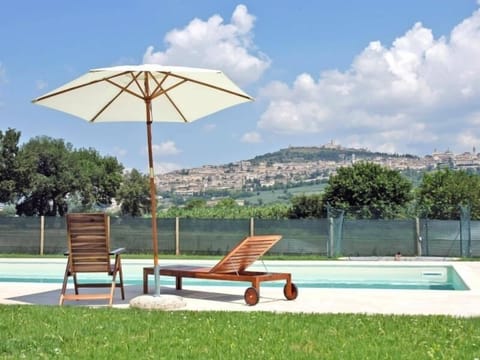 Seasonal outdoor pool, pool umbrellas, sun loungers