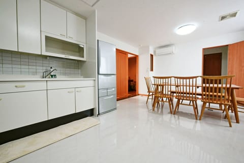 Traditional Apartment | Private kitchen | Full-size fridge, microwave, stovetop, electric kettle