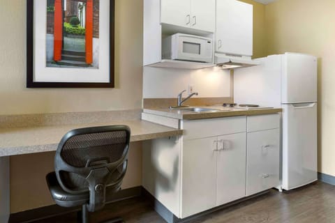 Studio, 1 Queen Bed, Non Smoking | Private kitchen | Full-size fridge, microwave, stovetop