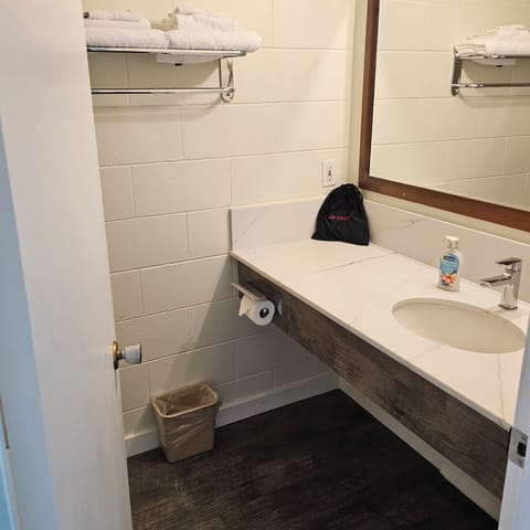 Combined shower/tub, hair dryer, towels, soap