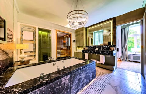 Premium Suite | Bathroom | Separate tub and shower, rainfall showerhead, eco-friendly toiletries