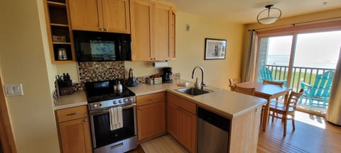 Osprey Suite – Second Floor Ocean Front View | Private kitchen | Full-size fridge, microwave, oven, stovetop