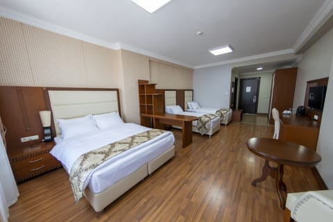 Family Quadruple Room, 1 Bedroom | Desk, laptop workspace, soundproofing, free WiFi