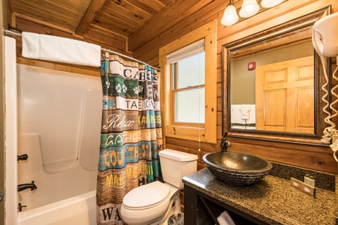 C 50R - Comfort Cabin, 1 King bed, Pet Friendly, Mountainside (May hear neighbors) | Bathroom | Combined shower/tub, free toiletries, hair dryer, towels