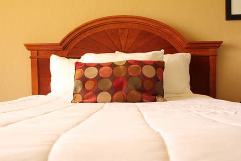 Premium bedding, pillowtop beds, desk, blackout drapes