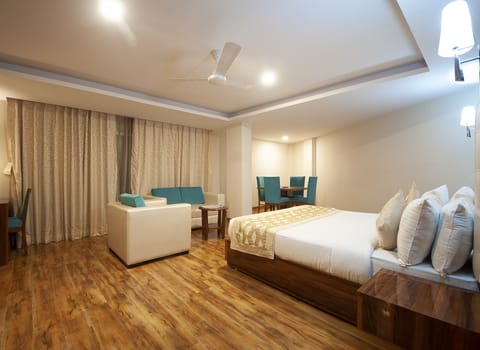 Suite Room with Airport Drop | 1 bedroom, premium bedding, in-room safe, desk