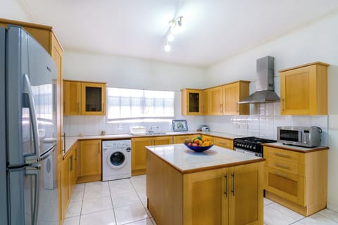 Apartment, 2 Bedrooms, 2 Bathrooms | Private kitchen | Full-size fridge, microwave, stovetop, dishwasher