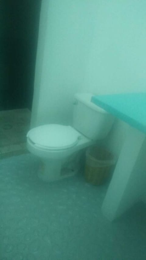 Economy Room | Bathroom | Shower, rainfall showerhead, towels, soap