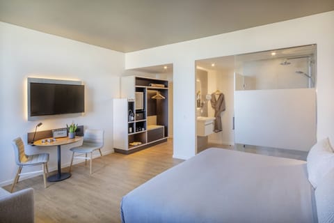 Premium bedding, memory foam beds, free minibar, in-room safe