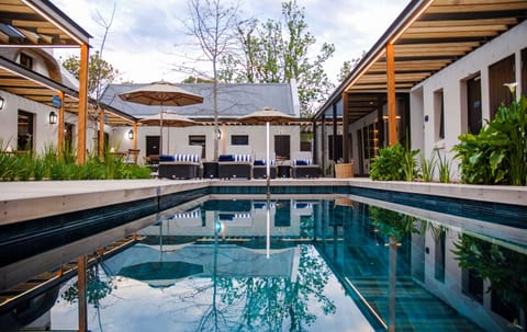 Outdoor pool, open 6:00 AM to 6:00 PM, sun loungers