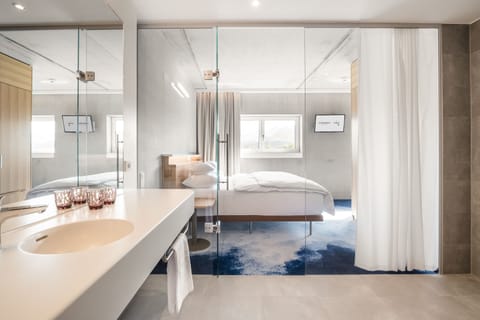 Hypo-allergenic bedding, blackout drapes, soundproofing