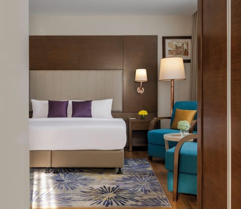 Deluxe Suite | Egyptian cotton sheets, premium bedding, down comforters, in-room safe