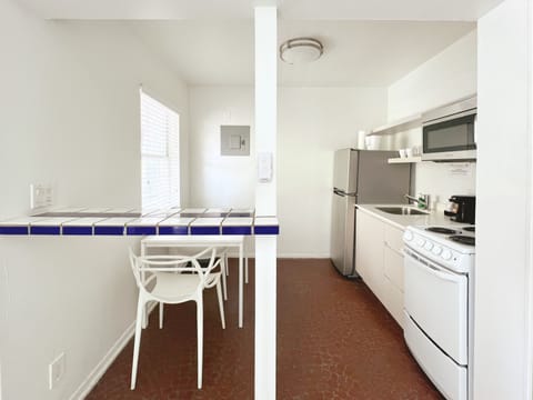 Deluxe Studio, 2 Queen Beds | Private kitchen | Fridge, microwave, coffee/tea maker, paper towels