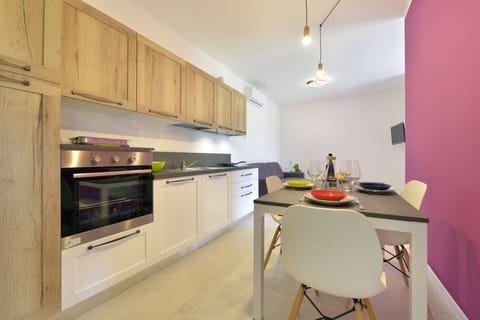 Apartment, 2 Bedrooms, Ground Floor | Private kitchenette | Full-size fridge, microwave, oven, stovetop