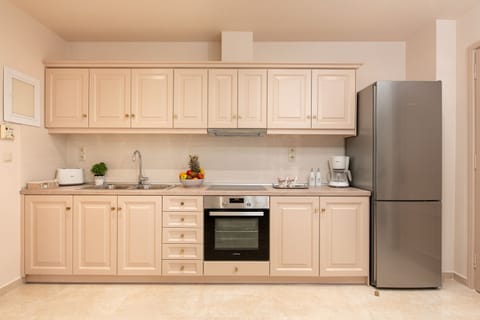 Deluxe Apartment, 2 Bedrooms | Private kitchen | Full-size fridge, microwave, oven, stovetop