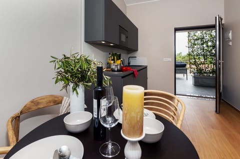Deluxe Apartment, 1 Bedroom, Terrace | Living area | Flat-screen TV