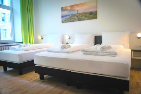 Standard Triple Room | Hypo-allergenic bedding, desk, free WiFi, bed sheets