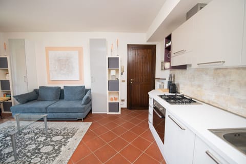 Family Apartment | Living area | 50-inch TV with cable channels