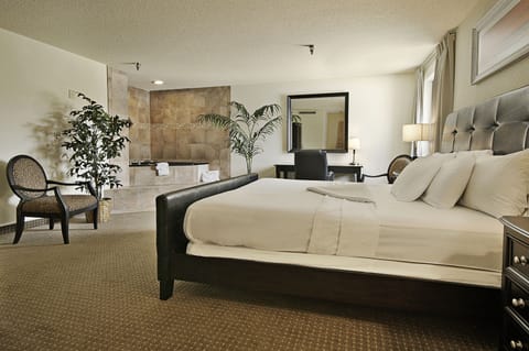 Suite, 1 King Bed, Non Smoking, Jetted Tub | Individually decorated, individually furnished, desk, iron/ironing board