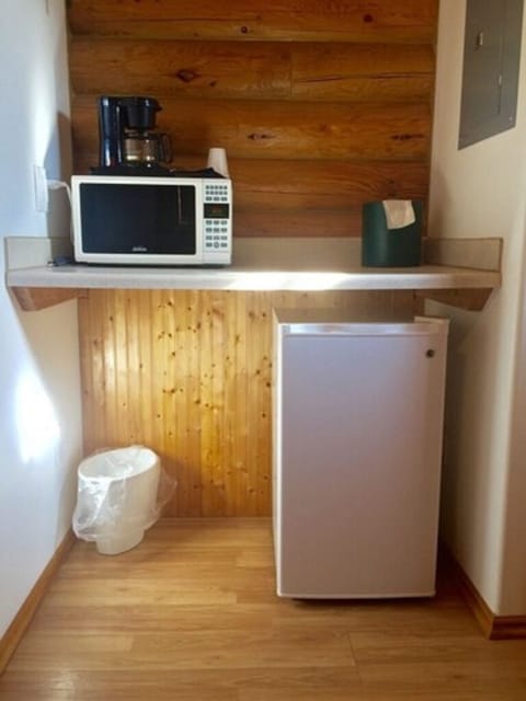 Microwave, coffee/tea maker, highchair, dining tables