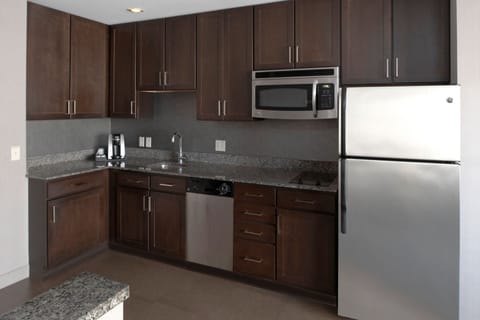 Suite, 1 Bedroom, Non Smoking | Private kitchen | Full-size fridge, microwave, stovetop, dishwasher