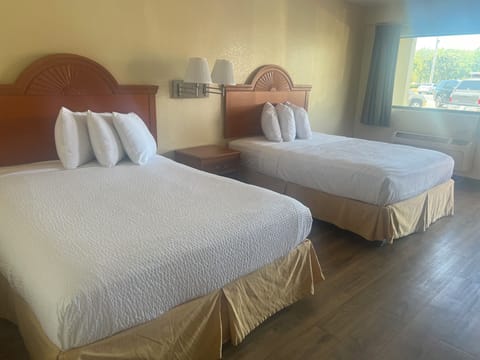 2 Queen Beds, Non-Smoking, Refrigerator, Microwave | Blackout drapes, soundproofing, free WiFi, bed sheets