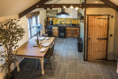 Cottage (1 Bedroom) | Living area | Flat-screen TV