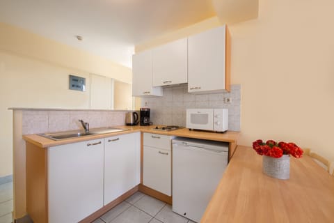 Superior Apartment, 1 Bedroom | Private kitchen | Fridge, microwave, stovetop, coffee/tea maker