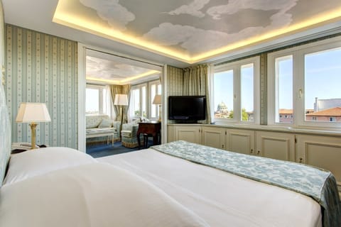 Junior Suite | Minibar, in-room safe, individually decorated, free WiFi