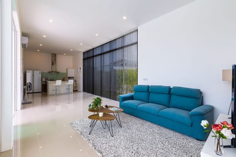 Villa | Living area | Flat-screen TV